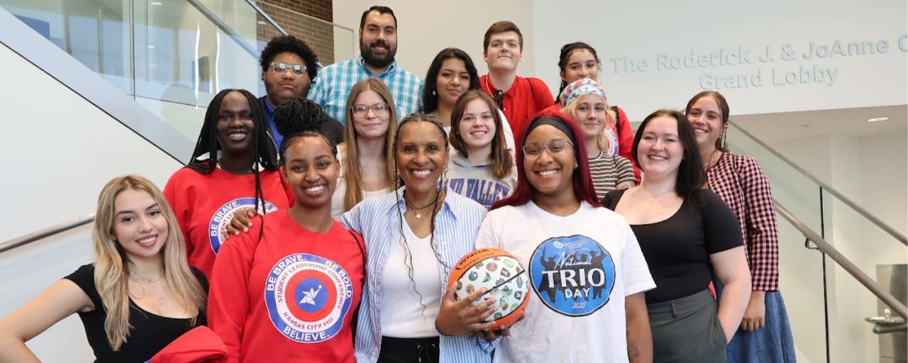 Students Pose with Speaker